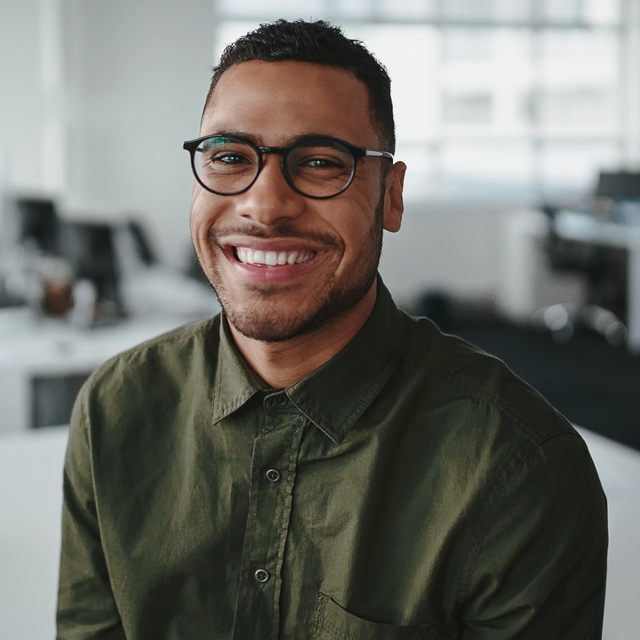 smiling man with glasses